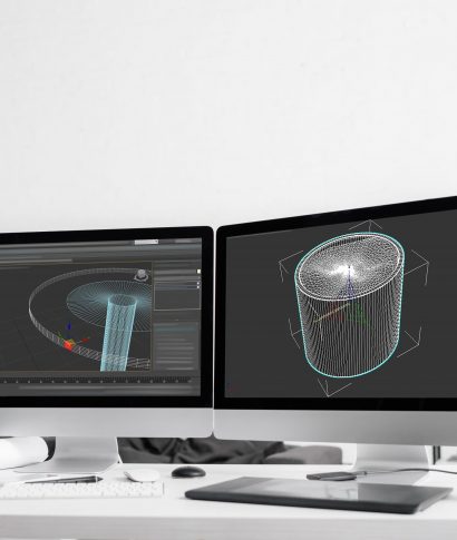 3d project of computer monitors, graphics tablet with coffee to go and vr headset on table in office